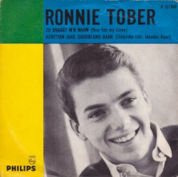 Zij draagt m’n naam / Achttien jaar, goudblond haar