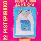 Piano, rumpu ja kukka