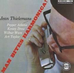 Man Bites Harmonica!