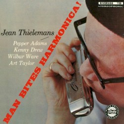 Man Bites Harmonica!