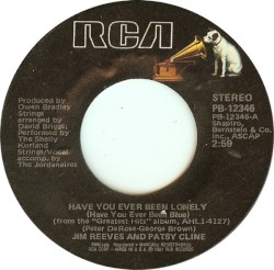 Have You Ever Been Lonely (Have You Ever Been Blue) / Welcome to My World