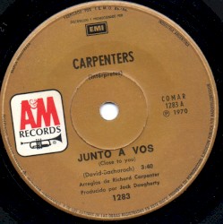 Junto a Vos = Close to You / Segui Amandote = I Kept on Loving You