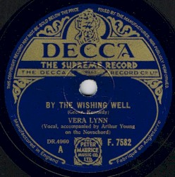 By the Wishing Well / Little Curly Hair in a High Chair