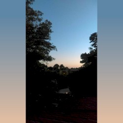 Standing at the Top of the Stairs at Dusk