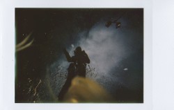 Father Nightingale, Drinking Whiskey in the Rain, Like the Water Tower Preacher Who Took a Walk Out Across the Ocean; He Needs a Thousand More Oceans to Swallow Before He Finds His Egalitarian God