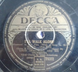 I'll Walk Alone / Kiss of Fire