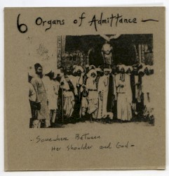 Somewhere Between Her Shoulder and God