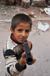 Wild Winds Are Howling Like Hungry Coyotes, and I Remember Every Single Day When I Was a Child Soldier With No Guts, Whose Blood Mixed With Thunder; It's a Long Way From Here, Wild Winds No Longer Howl, and My Blood Is Now Mixed With Passion, Passion and Life; I Am a Child Soldier Set Free!