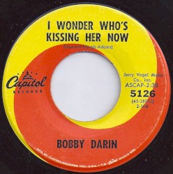I Wonder Who's Kissing Her Now / As Long as I'm Singing