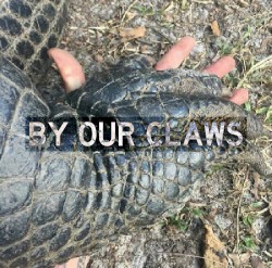 BY OUR CLAWS