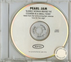 Elderly Woman Behind the Counter in a Small Town