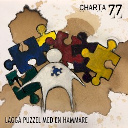 LĂ€gga puzzel med en hammare