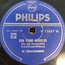 Een oude bierfles / De schooier en zijn hond