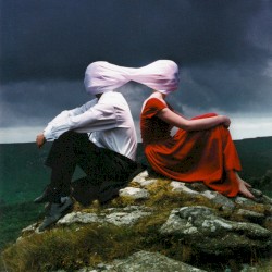 Casually Dressed & Deep in Conversation