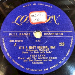 It's a Most Unusual Day / Put Your Dreams Away (For Another Day)