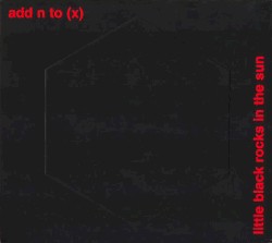 Little Black Rocks in the Sun