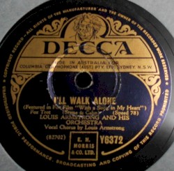 I'll Walk Alone / Kiss of Fire