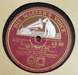 Say It With a Kiss / What Is There to Say?