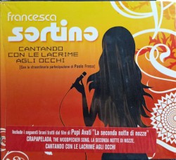 Cantando con le lacrime agli occhi