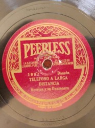 Teléfono a larga distancia / La pajarera