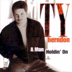 A Man Holdin' On (To A Woman Lettin' Go)