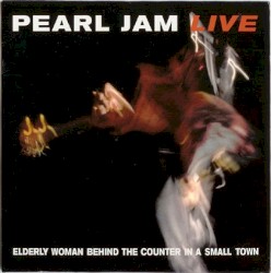 Elderly Woman Behind the Counter in a Small Town