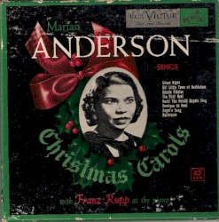 Sings Christmas Carols